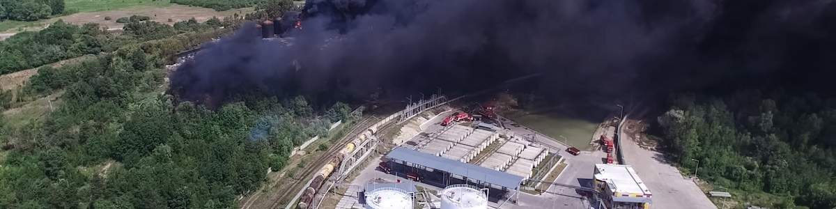 Forest fire next to a storage facility