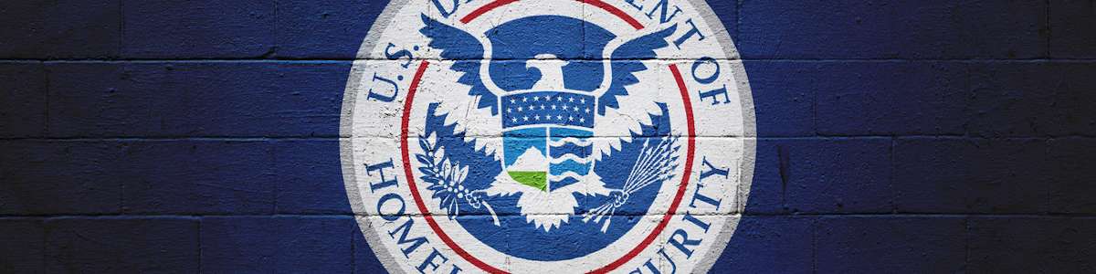 The Department of Homeland Security logo painted on a wall