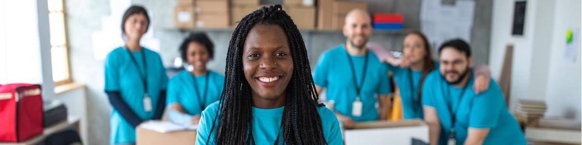 Women managing a group of volunteers for a non-profit organization